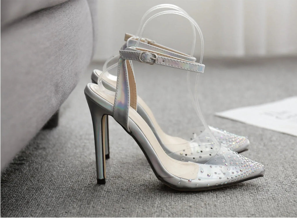 Women's pointed toe diamond sandals with a stiletto heel, showing PVC upper material.