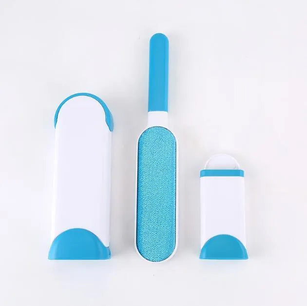 Blue reusable pet hair removal brush with sticky flannel head placed in its self-cleaning base.