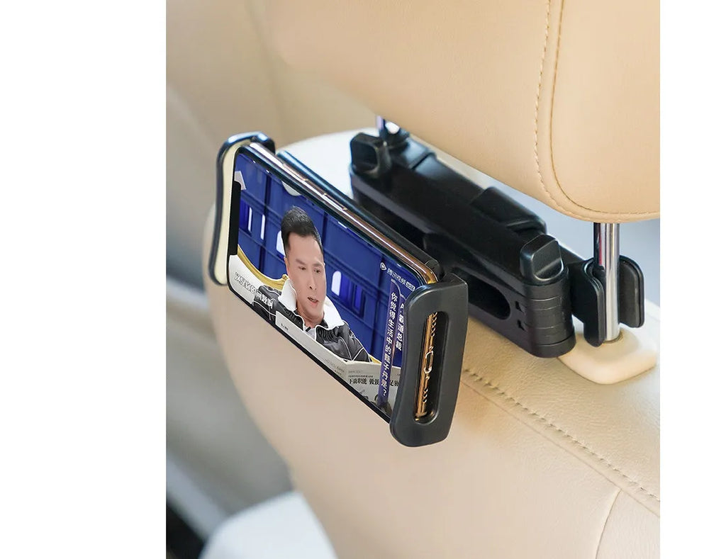 Black universal car phone holder attached to vehicle rear seat base with tablet mounted