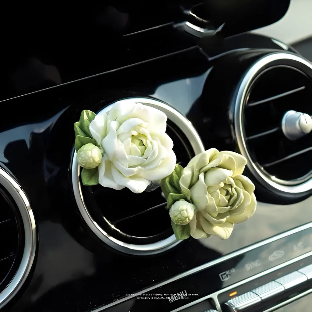 Jasmine scent solid gypsum car air vent perfume clip in beige white or fresh green.