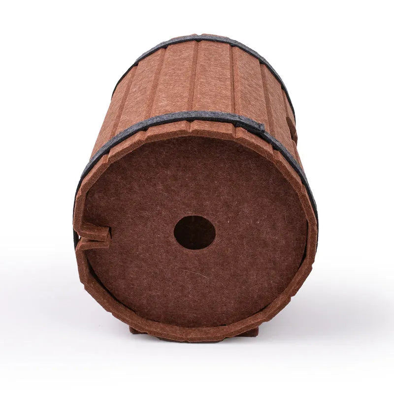 Assembled wine barrel pet bed for cats with soft interior, shown alongside its three flat felt panels and two binding straps.