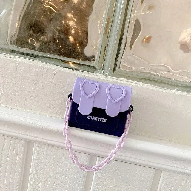Silicone clamshell earphone case with chain bag in purple, compatible with AirPods Pro and AirPods 1/2