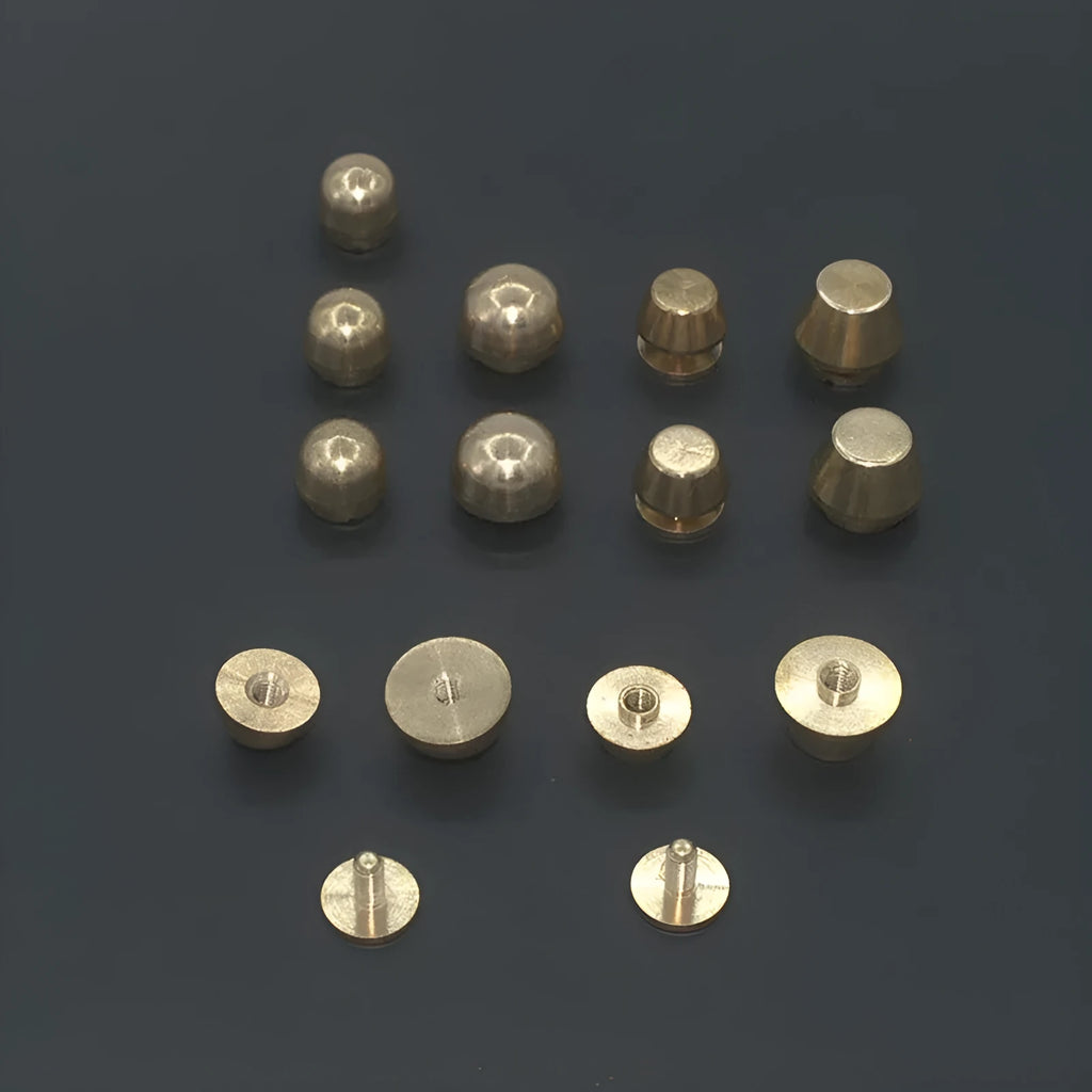 Brass decorative foot nail buckle in round and geometric designs, sizes 10x6mm and 12x7mm.