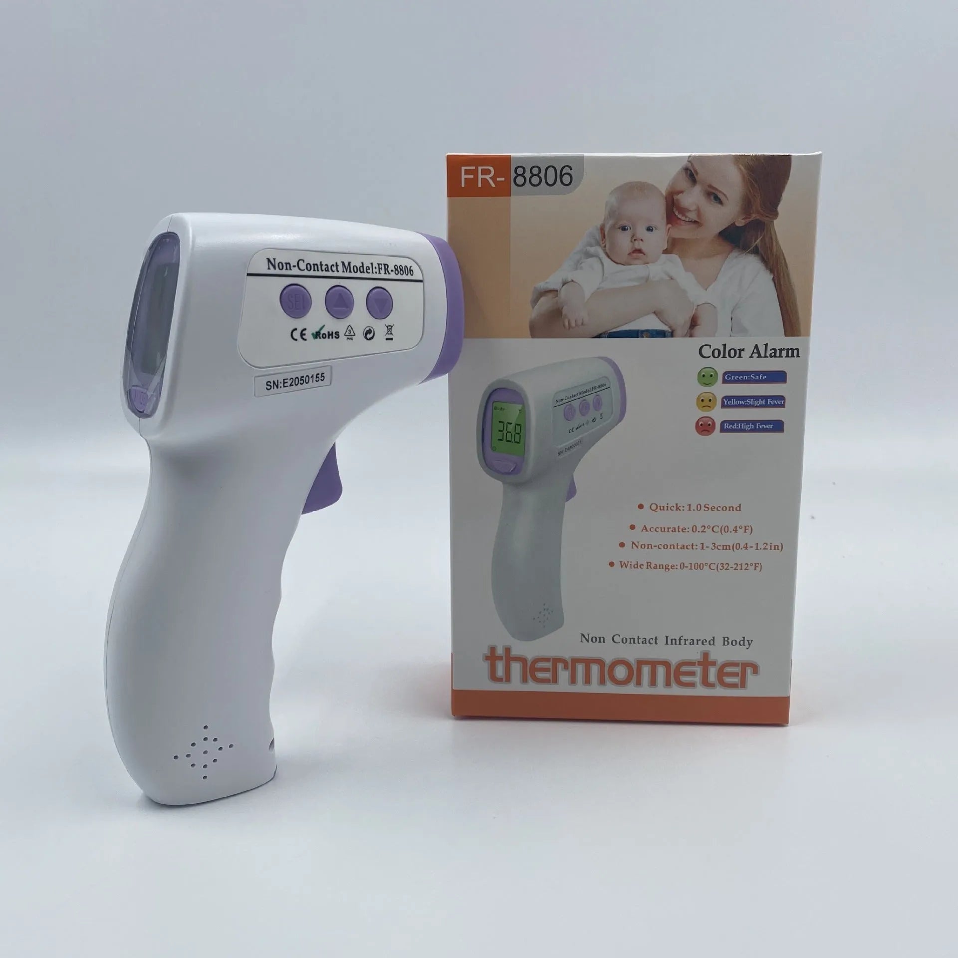 White digital thermometer for non-contact temperature measurement on a table.