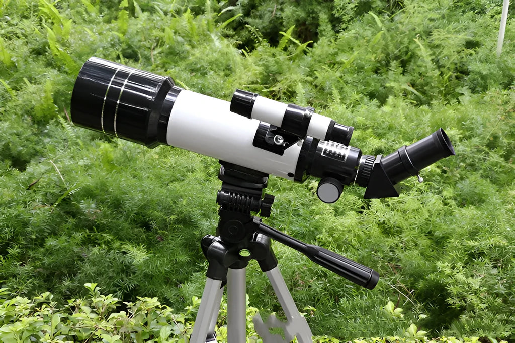 Dark blue children's astronomical telescope on tripod with 16X to 66X magnification for stargazing
