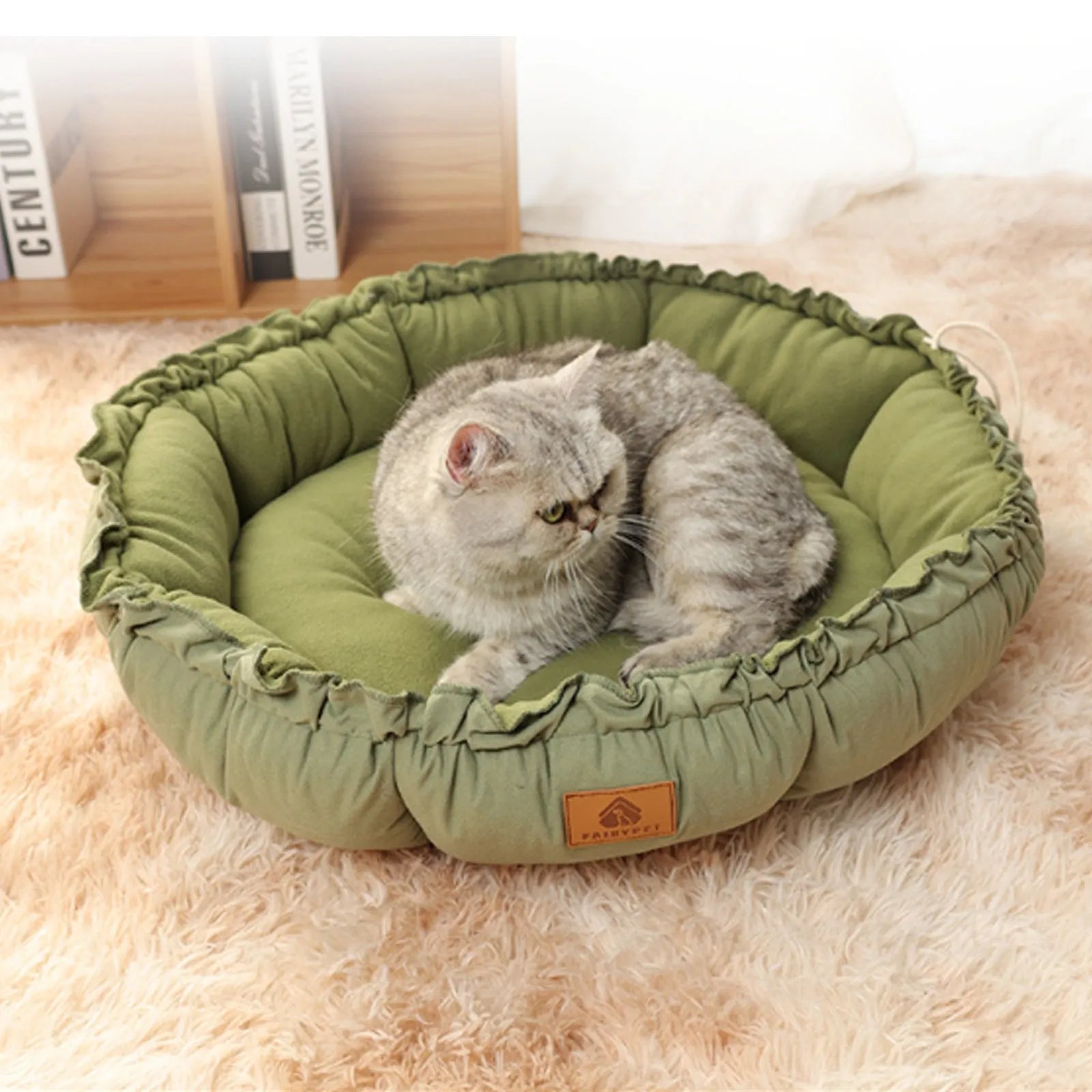 Grey and green reversible donut pet bed for cats and small dogs showing dual-sided design