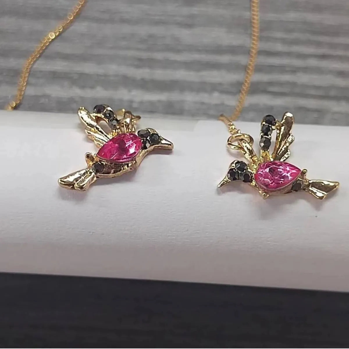 Long bird hanging earrings with mixed zirconium wings in blue, red, and red lvzuan colour options.
