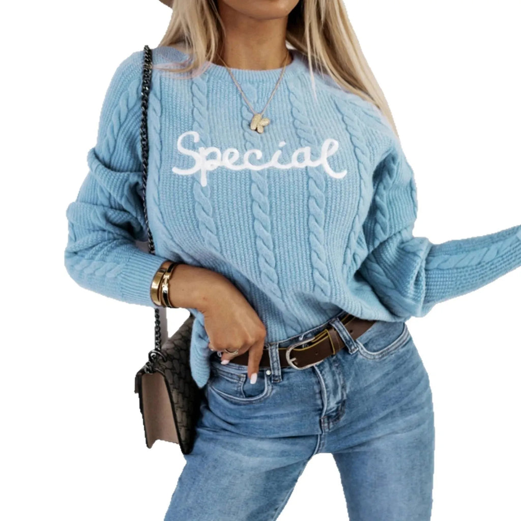 Blue men's crew neck sweater with embroidered letters and numbers on the chest.