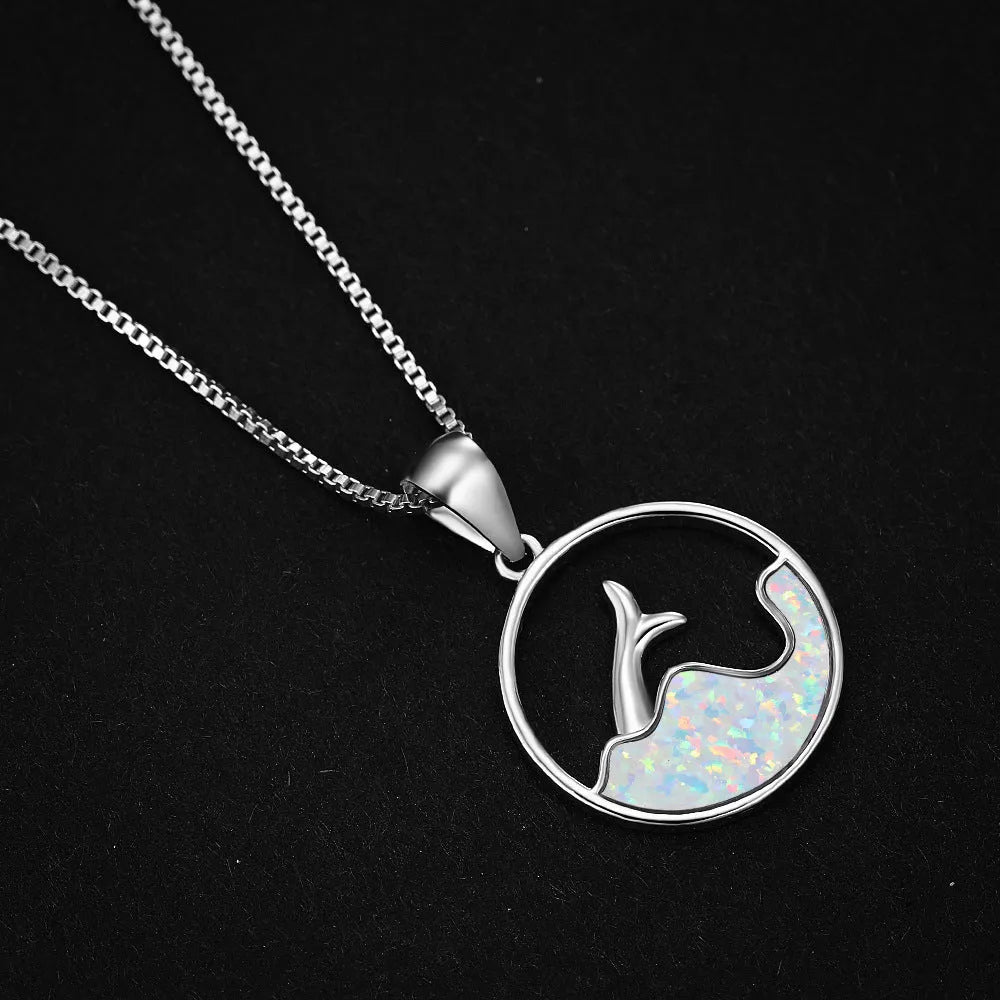 Round copper pendant necklace with sea fishtail geometry design in electroplated platinum blue opal finish