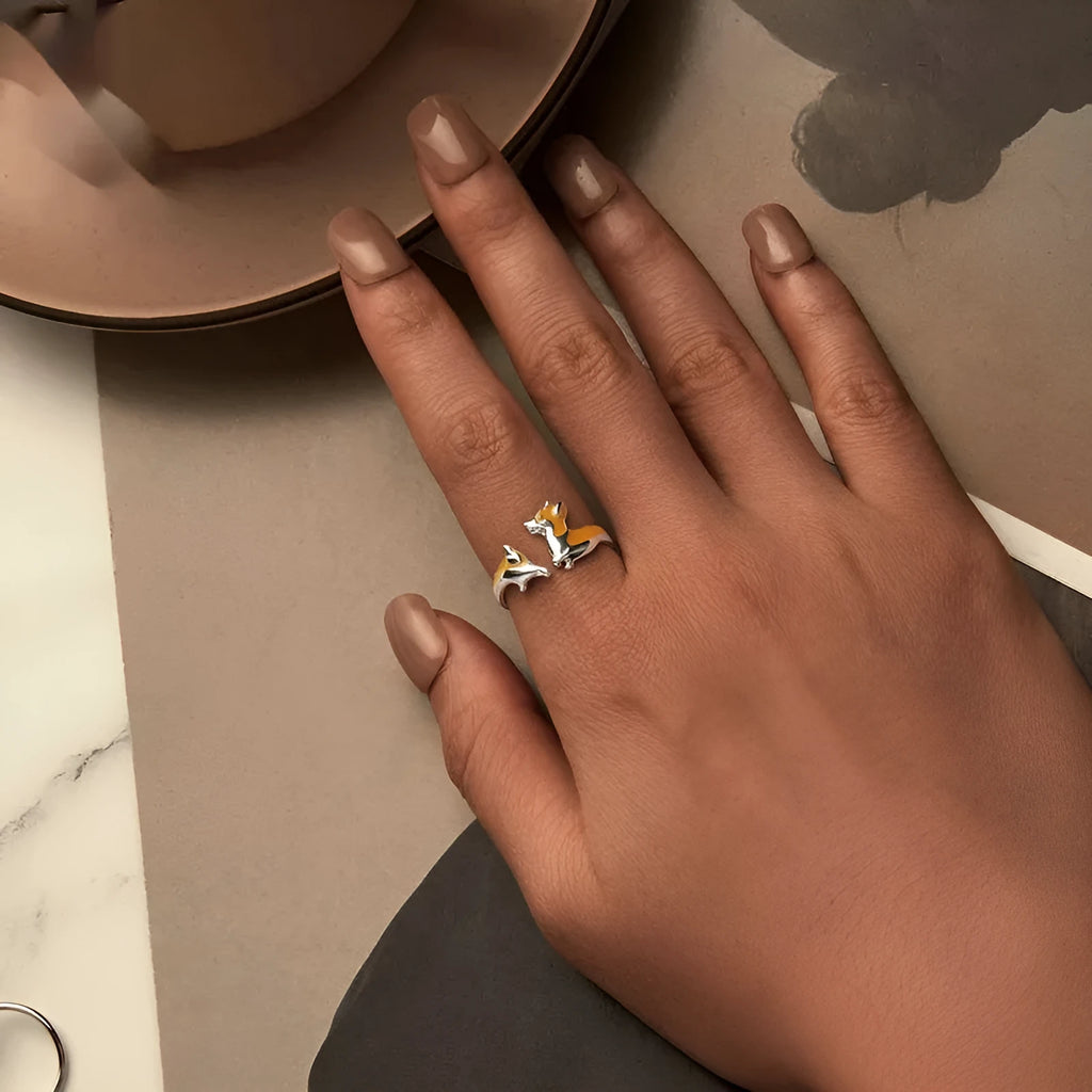 Silver cartoon corgi dog ring for women with electroplated finish.