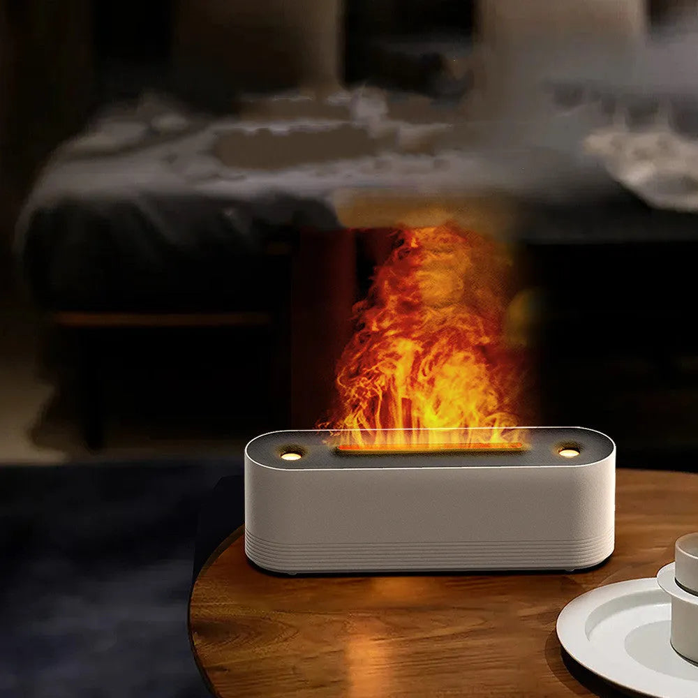 Black Flame Air ultrasonic humidifier diffuser emitting cool mist with a multi-colour LED flame light effect at its base.