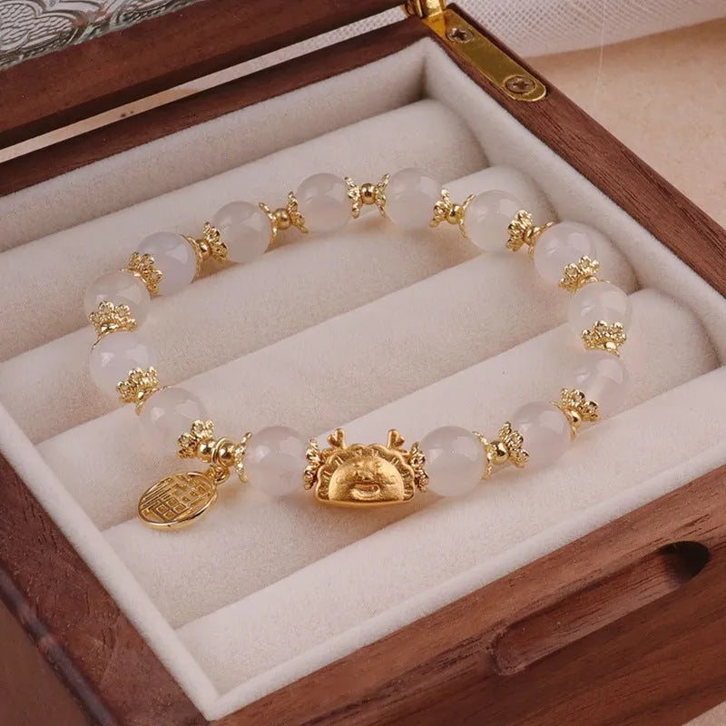 Floral glazed zodiac bracelet with electroplated finish and coloured glass beads
