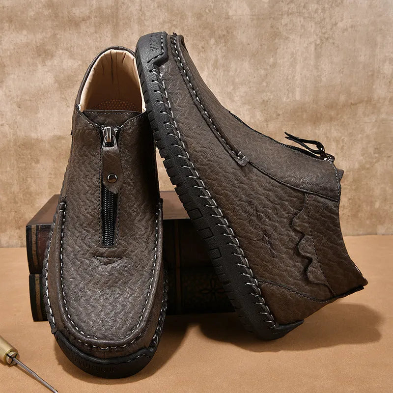 Men's black slip-on leather loafers with round toe and low heel design