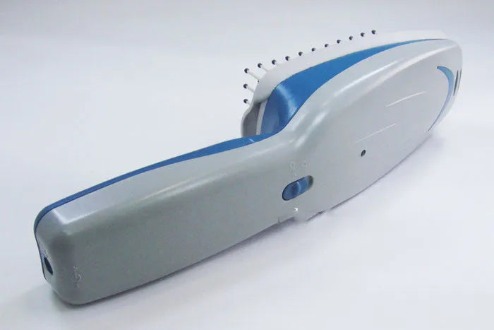 Negative ion pet grooming comb with removable brush head, measuring approximately 21.5cm long