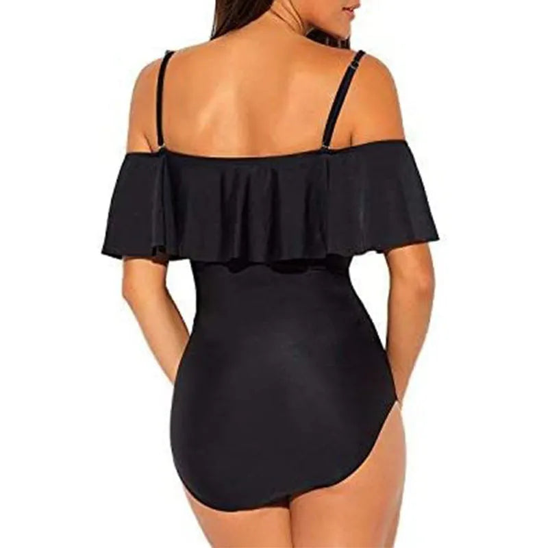 Black one-piece swimsuit with cut-out design and ruffled straps for swimming