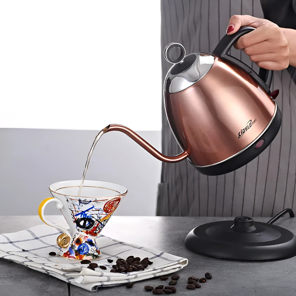 Full-automatic stainless steel kettle in gold colour with touch control panel.