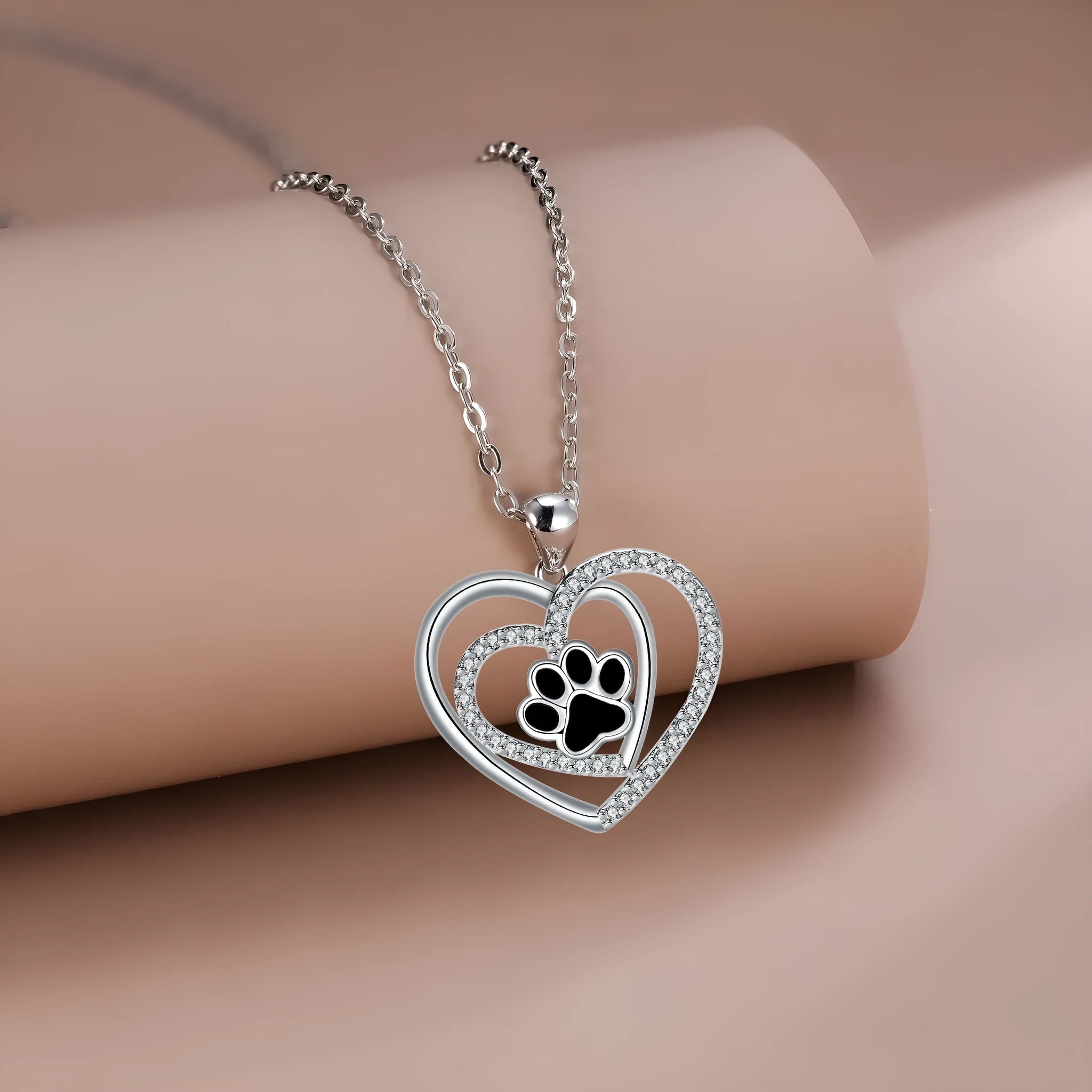 Women's silver tone dog paw prints heart necklace with copper pendant and cross chain