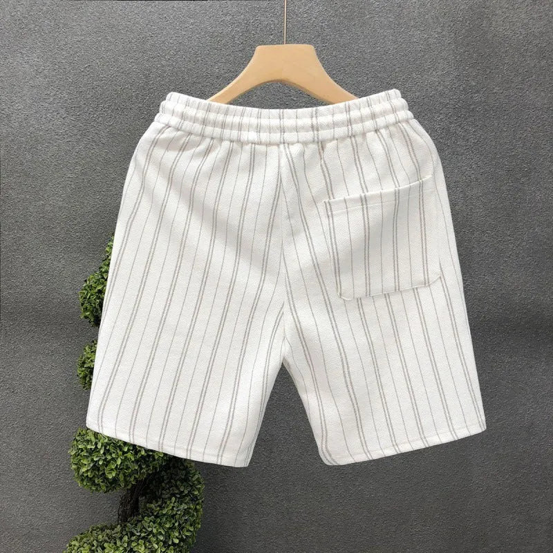 Men's black and white striped casual shorts with an ankle band and double-layer waistband.