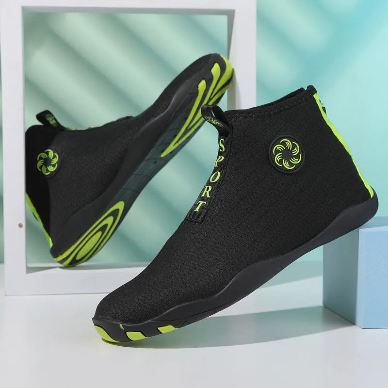 Mid-top beach shoes in black and fluorescent green colour with mesh fabric upper and rubber sole