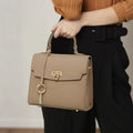 Elephant grey vintage handbag with litchi pattern lock and cowhide leather construction
