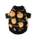 Black dog sweater with orange pumpkin print, shown on a dog for Halloween.
