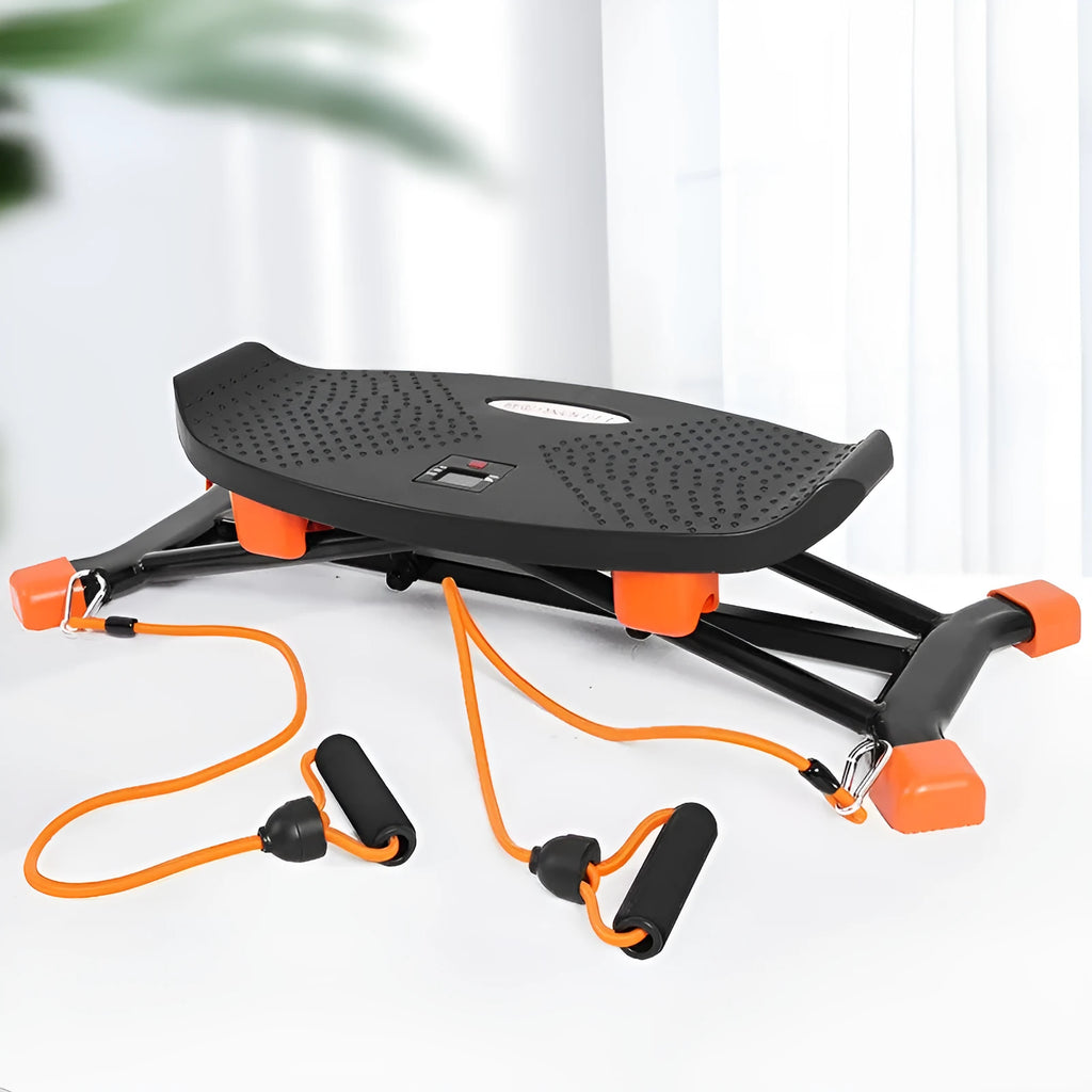 Black foldable mini fitness skiing machine JS101A with elastic hand straps on a home floor.
