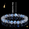 Natural cream coloured crystal bracelet on a wrist showing its simple unisex design and smooth ground beads.