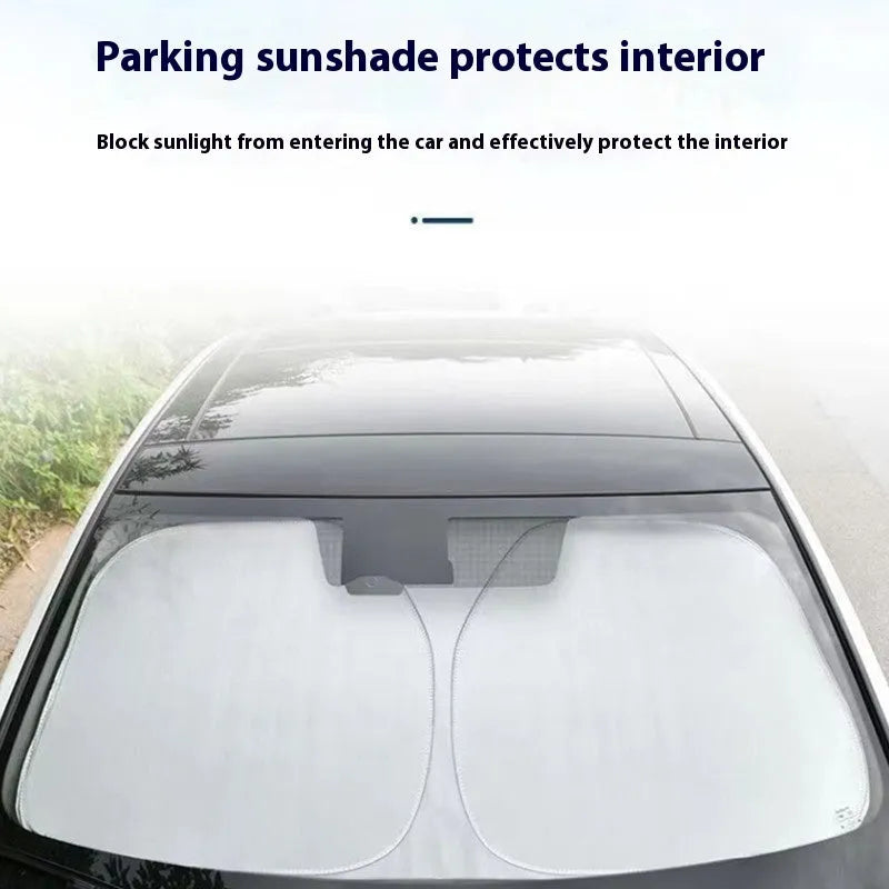 Universal fit aluminium foil car windscreen sunshade showing titanium silver reflective surface.
