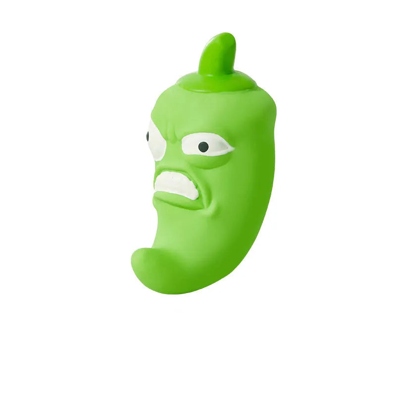 Bitter melon or chilli shaped dog chew toy with textured surface for teeth cleaning and integrated sound element