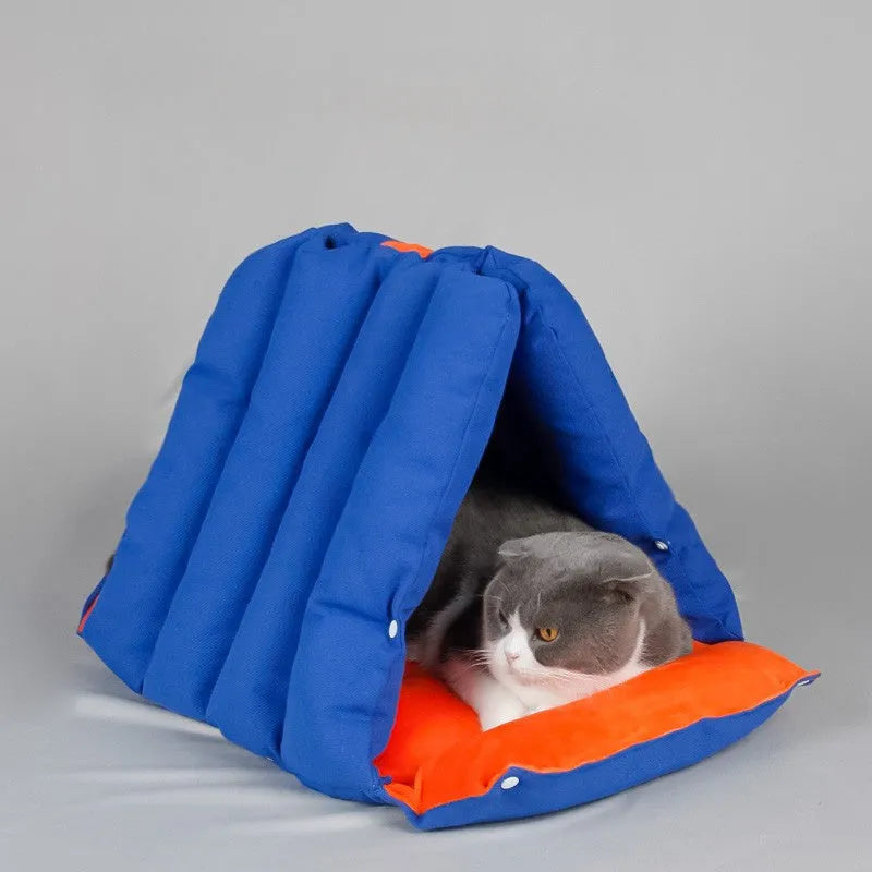 Blue triangular cat bed with removable cotton cover and side combination holes