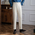 Man wearing black high-waist straight-leg casual polyester trousers for leisure.