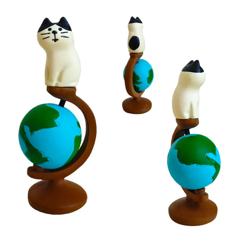 Cartoon-style resin figurine of a cat dressed as the Statue of Liberty, showing Earth Instrument Cat and Carp Cat style options.