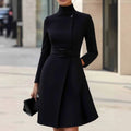 Women's black casual dress with high waist, stand collar, long sleeves, and zipper closure in bohemian style