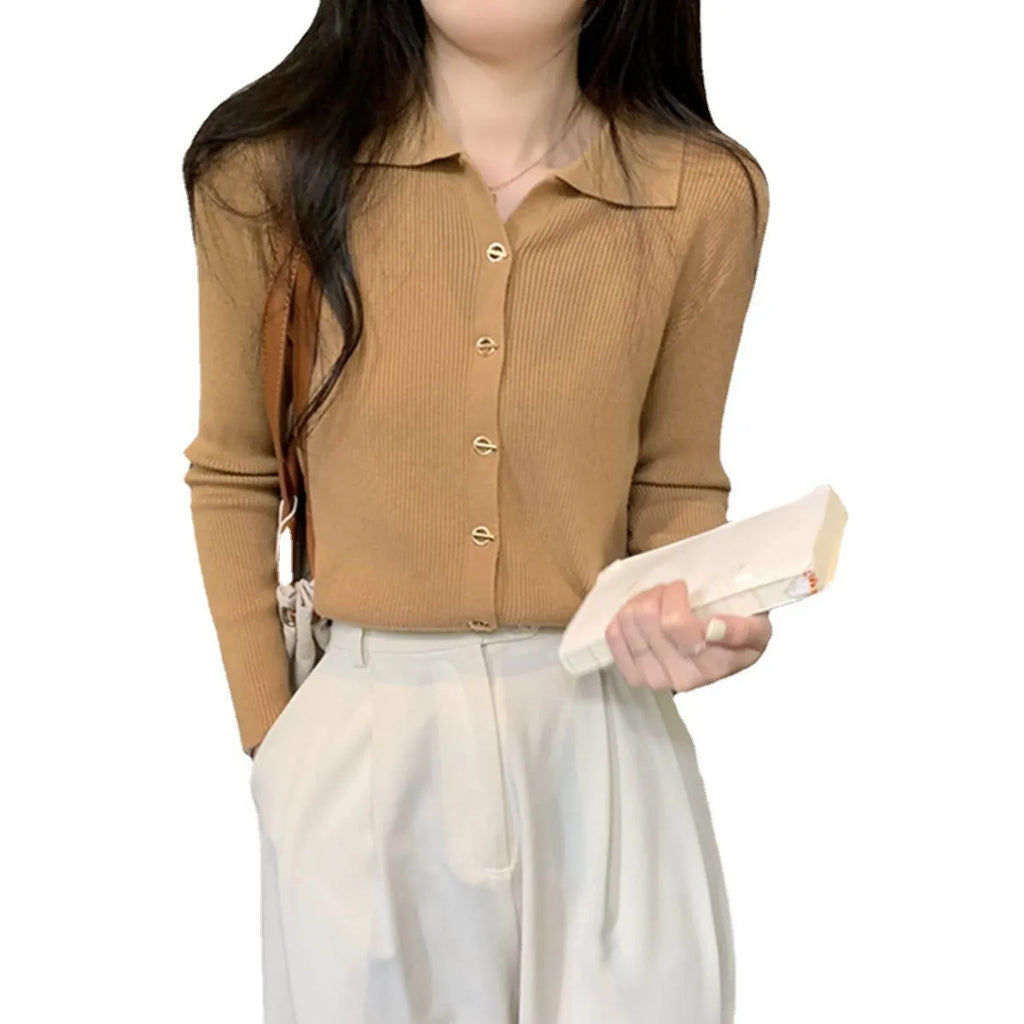 Gentle long-sleeved knitted cardigan in viscose fibre with loose fit design shown in beige colour