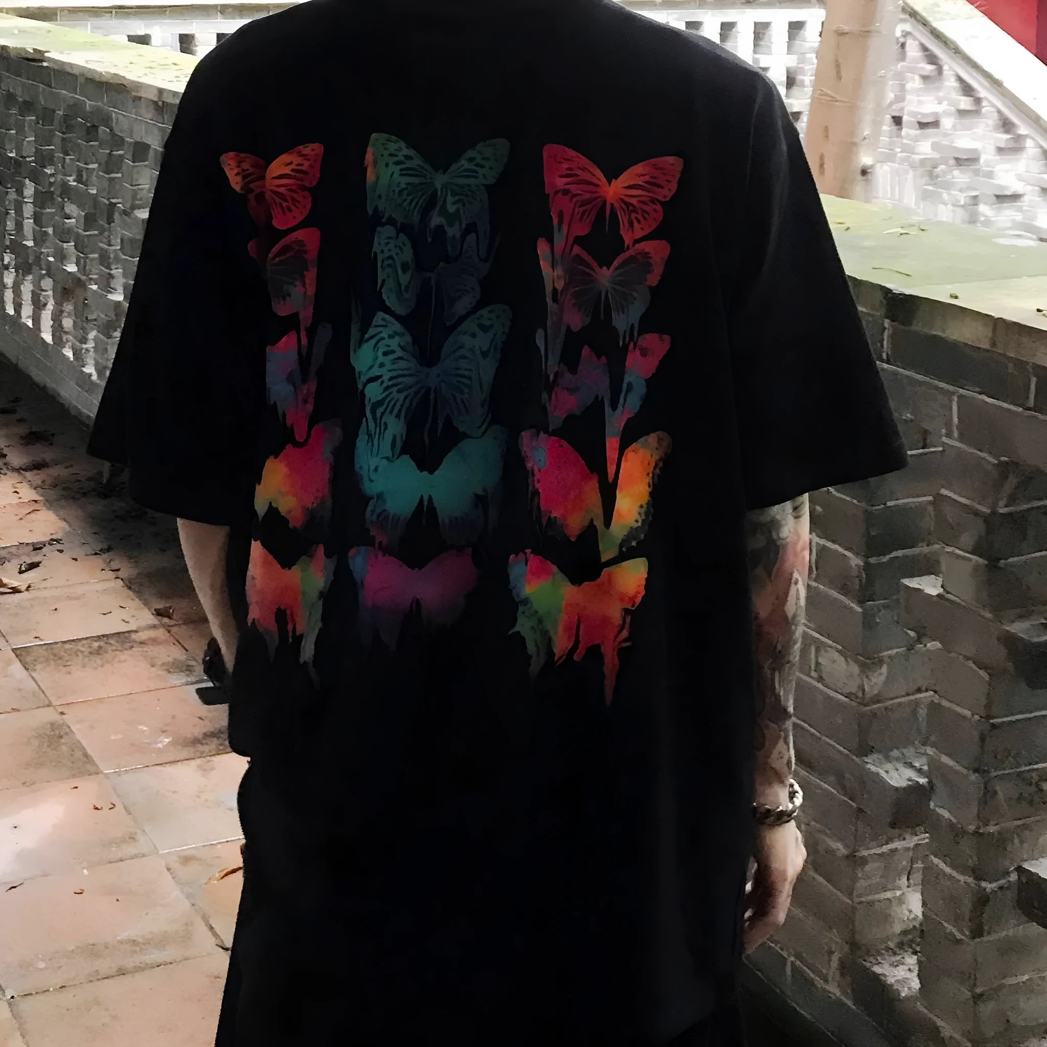 Men's black loose fit short sleeve polyester t-shirt with alphabet pattern