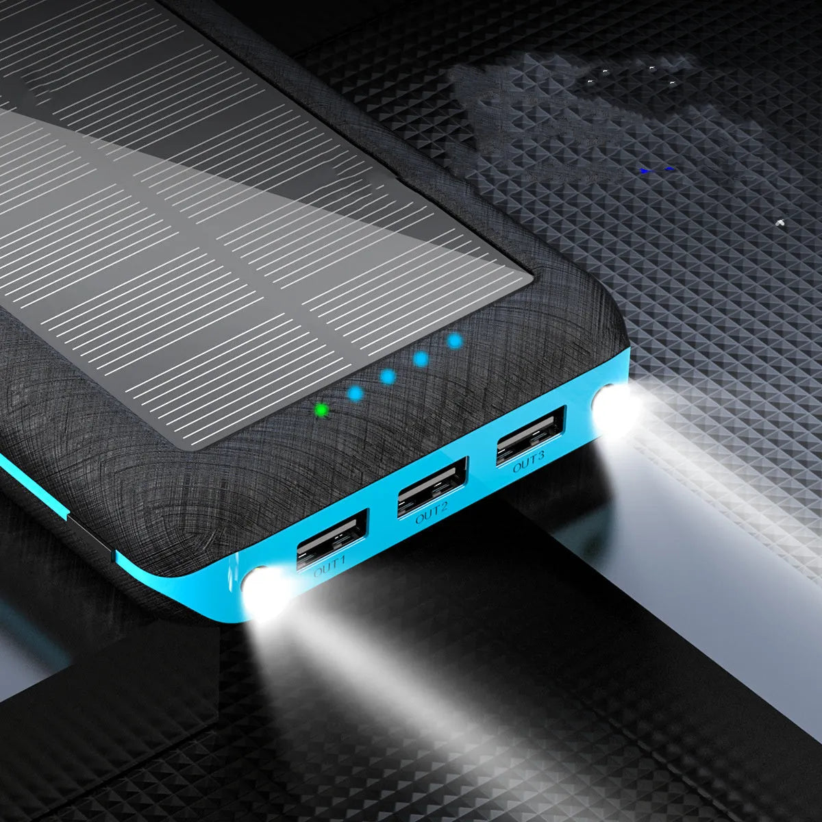Black portable power bank with wireless charging surface and three USB ports for multiple device charging