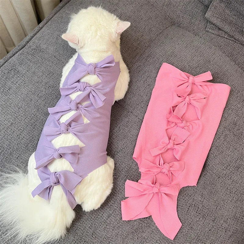 Lace-up cat sterilisation recovery clothing in purple, showing the adjustable fastening and full-body design.