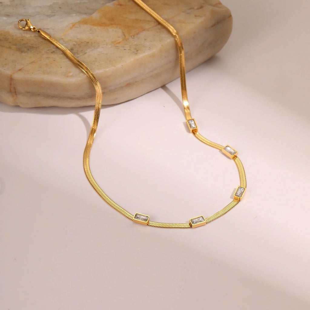Geometric square zircon necklace on stainless steel flat snake chain in gold or steel finish