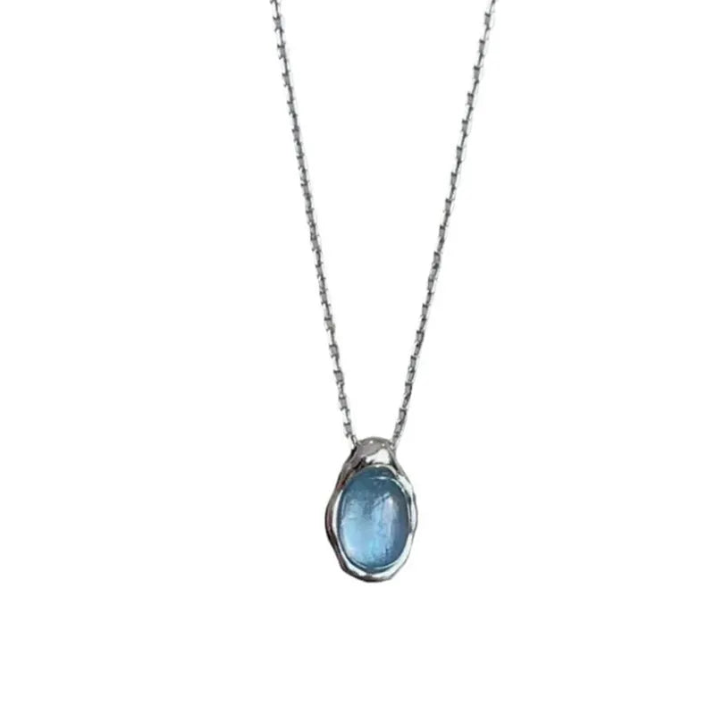 Women's navy blue water drop pendant necklace with geometric copper pendant and cross chain design