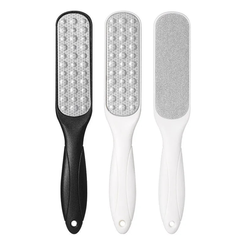 Stainless steel double-sided foot grinder for callus removal, shown in black and white colour options.