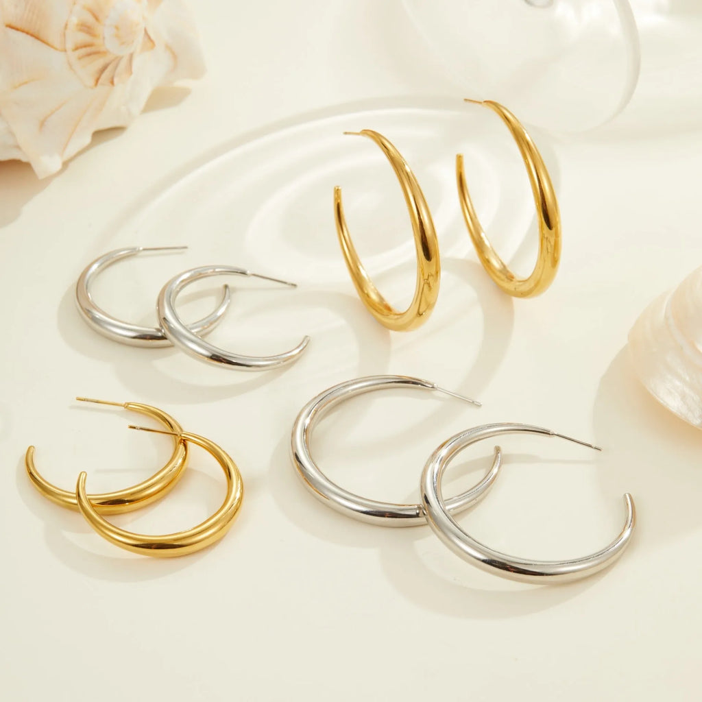 Titanium steel hoop earrings with geometric round design in gold and steel colour options
