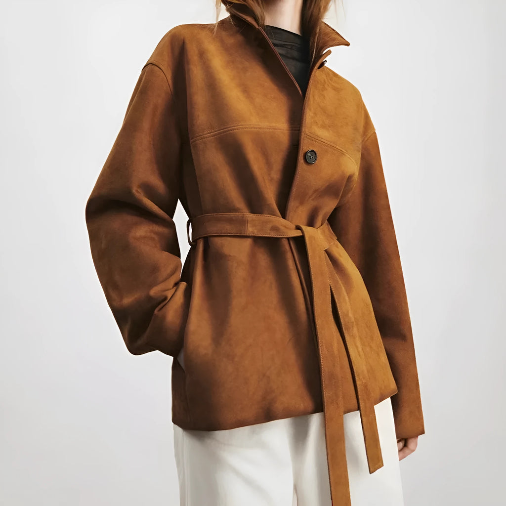 Yellow brown retro-style women's cashmere coat with a Peter Pan collar, leather stitching, and a belt.