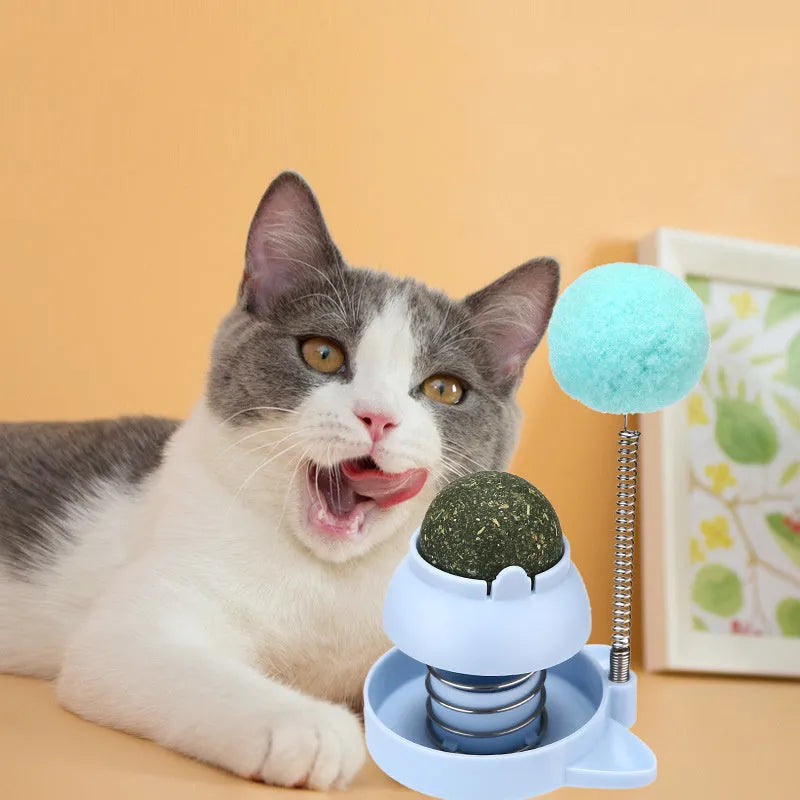 Blue, orange, and pink lucky cat licking music mint ball toy measuring 55mm.