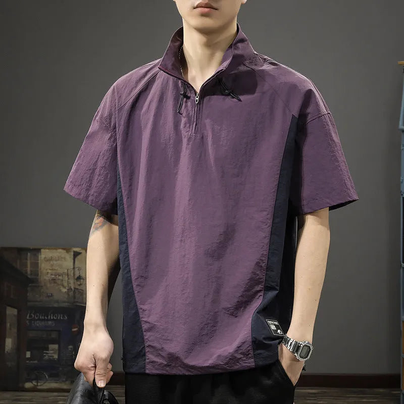 Brown men's loose-fit T-shirt with a half-zip stand collar and short sleeves.
