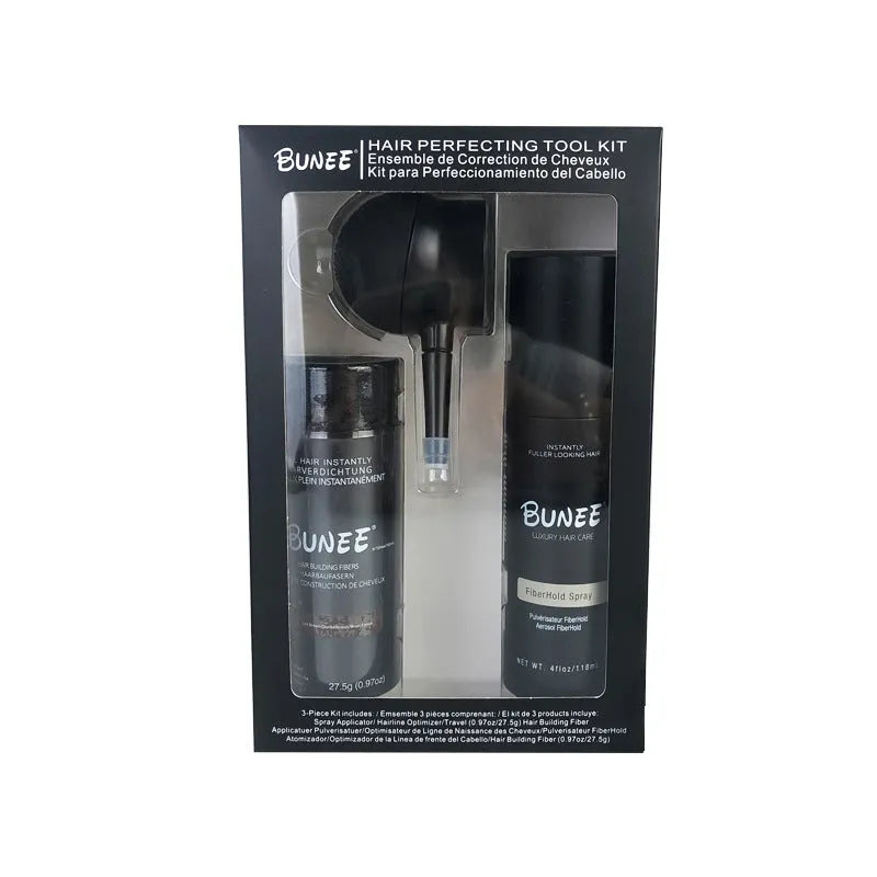 Boxed set of hair building fibre powder, styling spray and nozzle for volumising thin hair.
