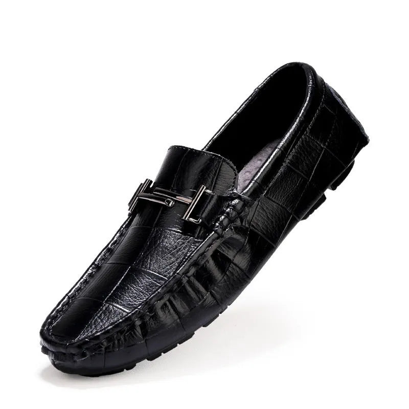 Men's casual leather shoes in large sizes with a buckle detail, low-cut design, and flat rubber sole.