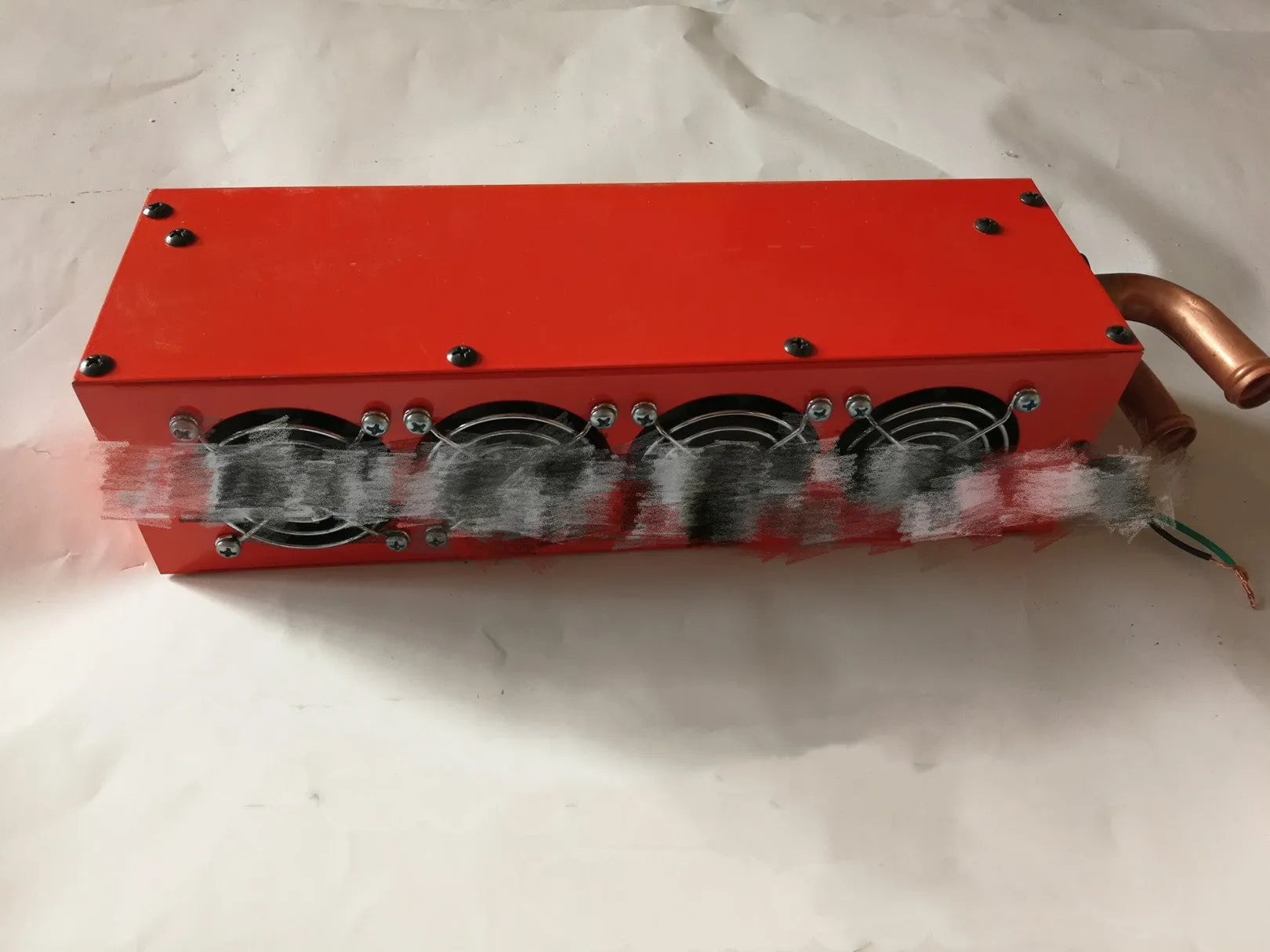Metal car heater unit with copper pipes for 12V 24V vehicle cabin heating and defrosting.