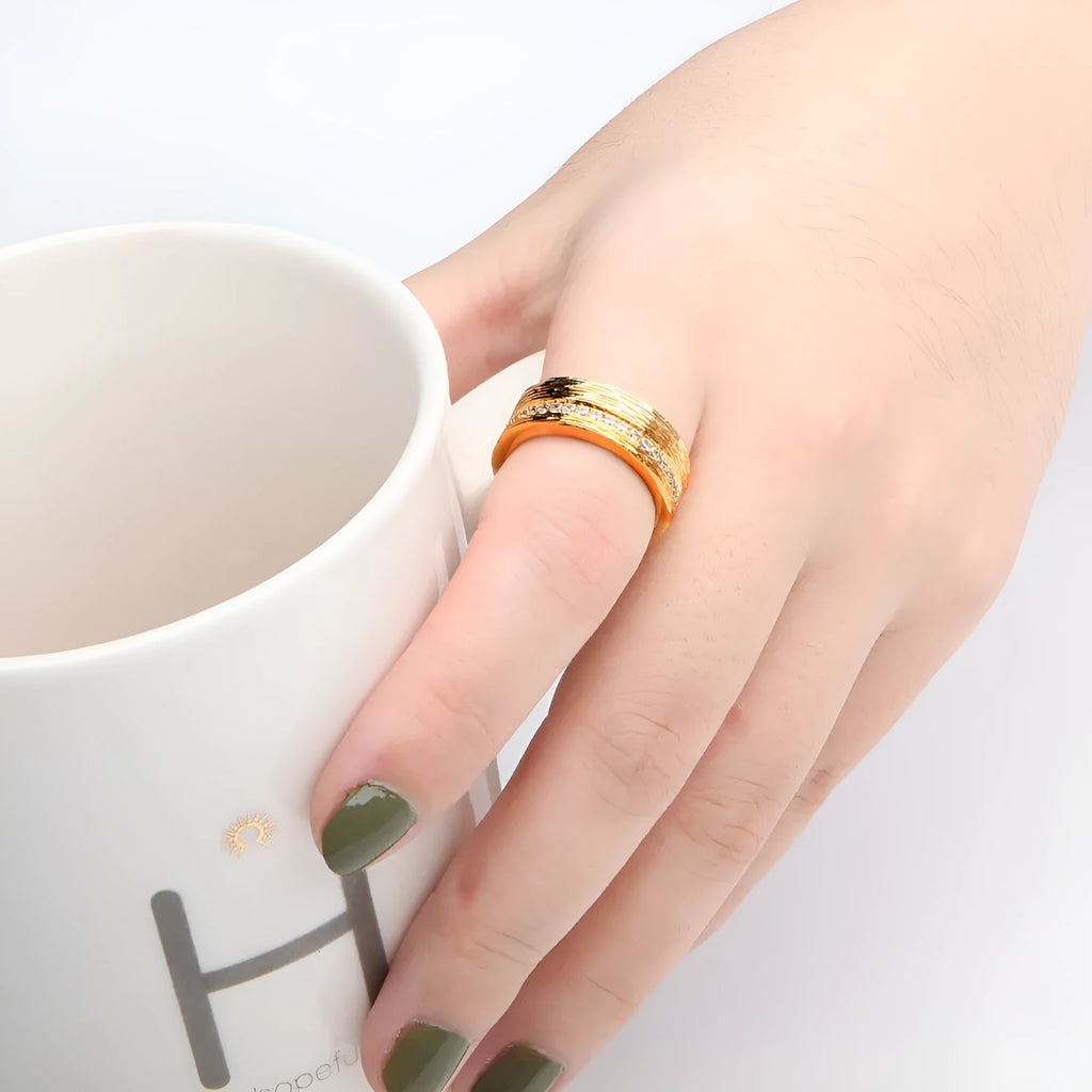 Geometric gold zircon ring for women showing angular design and electroplated finish