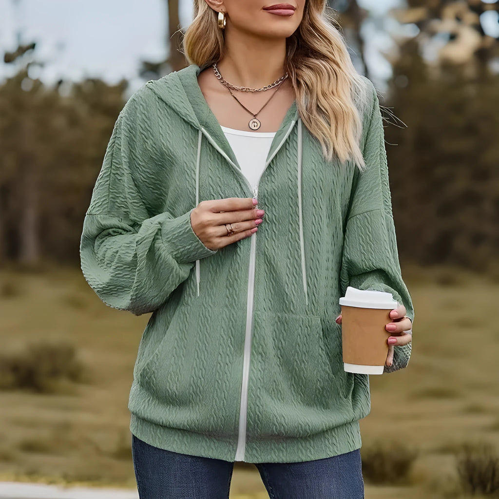 Green women's hooded sweater coat with full front zipper in a loose casual fit