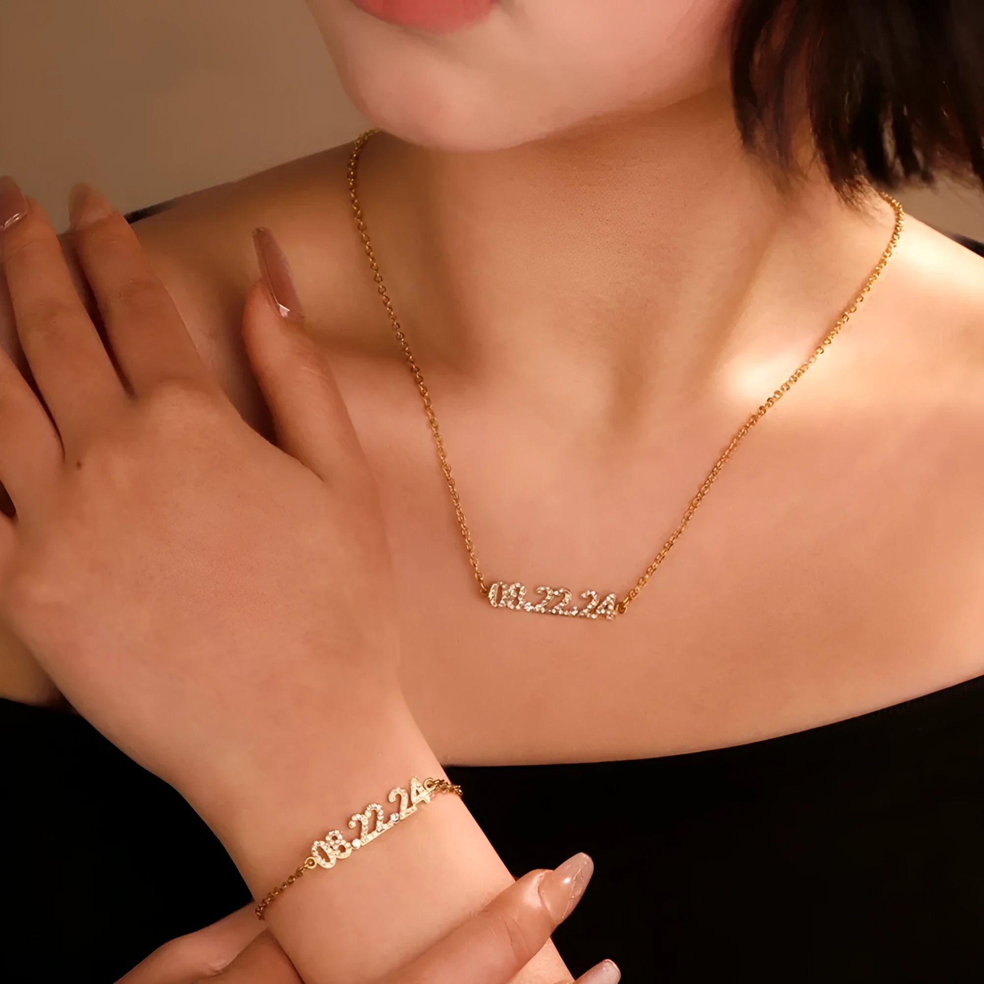 Stainless steel digital bracelet and necklace with diamond-set numbers in gold, rose gold, and steel finishes.